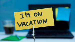 I am on vacation written