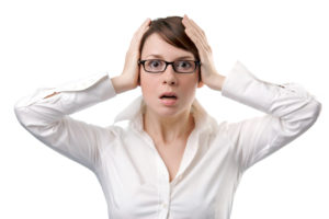 Young business woman panic
