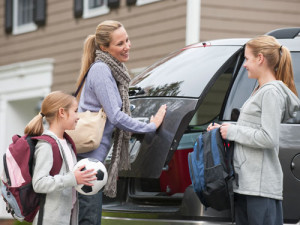 Family getting in van